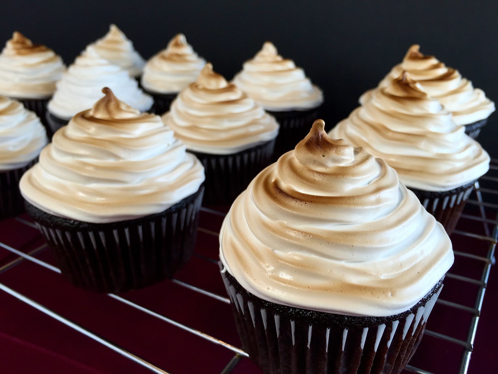 chocolate and peanut butter cookie dough cupcakes with toasted marshmallow