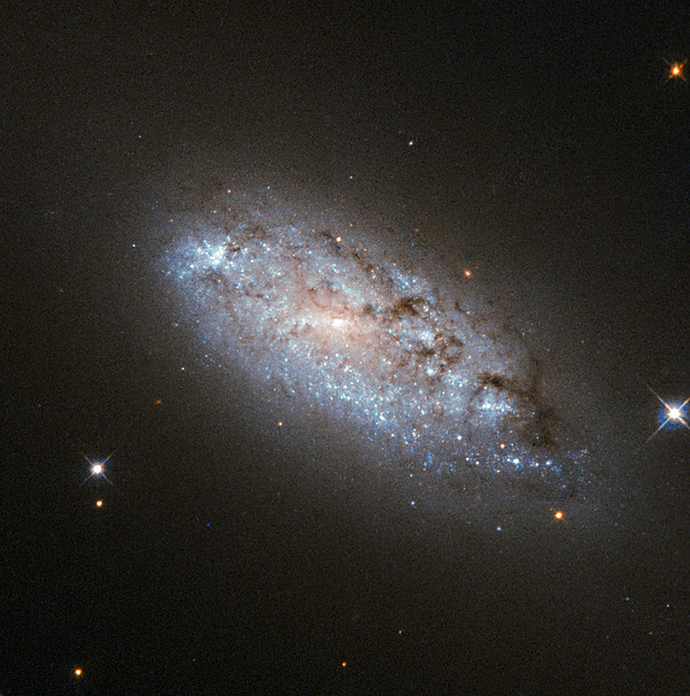 A Hubble Study of the Peculiar Asymmetry of NGC 949