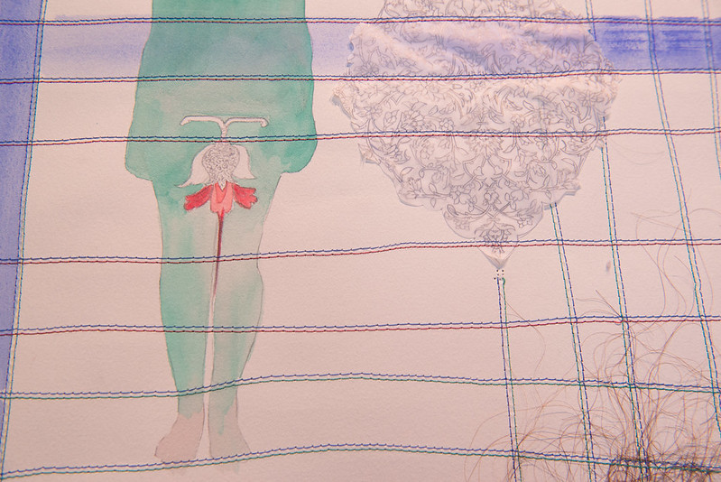 work on paper depicting woman and reproductive organs