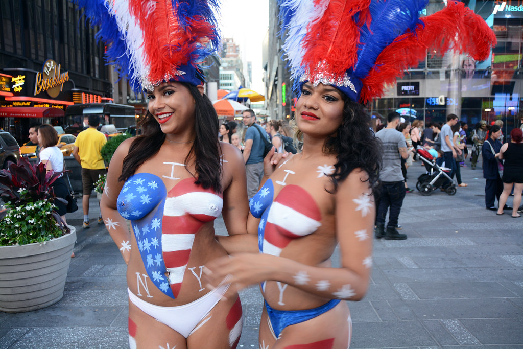 Women In Times Square In NYC Wearing Only Body Paint. 