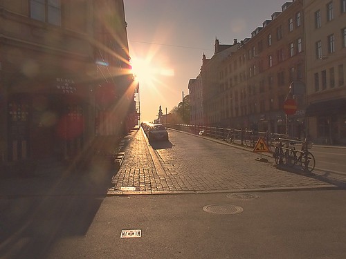 cobblestonestreet lensflare sunrise travelblog travel sodermalm stockholm