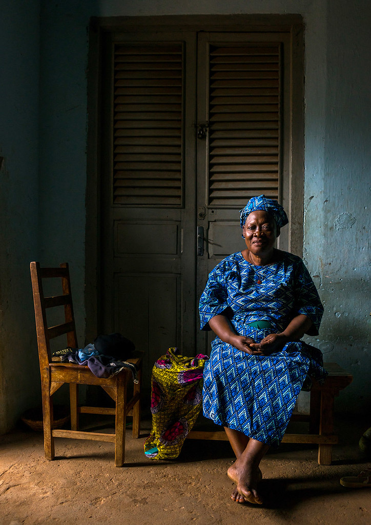 Benin, West Africa, Porto-Novo, old woman in her living room