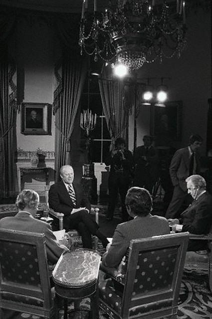 21 Apr 1975, Washington, DC, USA --- President Ford chats with CBS-TV correspondents as they prepare for their interview with the Chief Executive