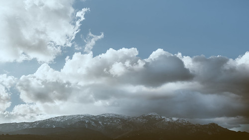 samos greece blue white snow winter cloud clouds sky nature landscape hill mount mountain light outside