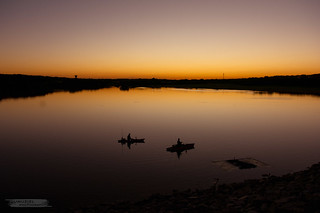 anglers at sunset