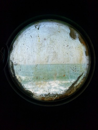 shipwindow porthole ocean blue dark window sea