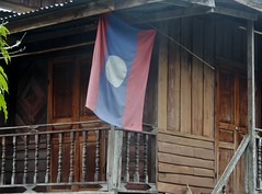Lao Flag Outside Wooden Building