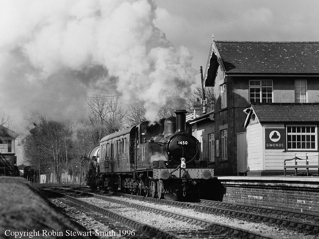 GWR 1P 0-4-2T Class 14xx No 1450 on a milk train working passing through Cranmore Station on the East Somerset Railway on 30th March 1996 (Copyright Robin Stewart-Smith - All Rights Reserved)