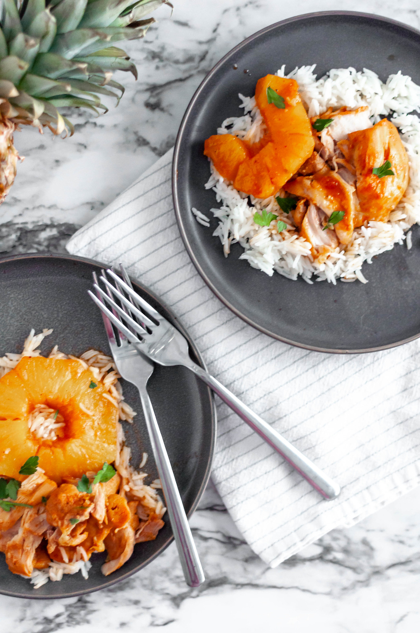 Pineapple BBQ Instant Pot Chicken is packed full of flavor and yields a super tender chicken. Serve over rice for a super simple and quick weeknight meal.