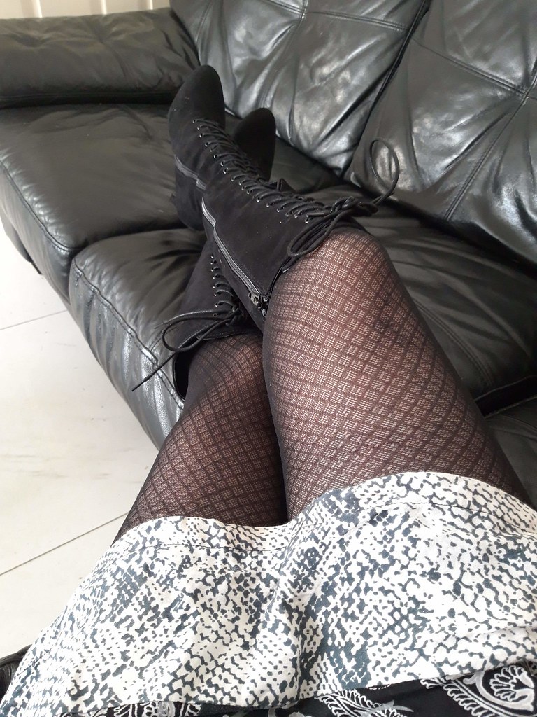 My wifes Sexy legs in black tights pic