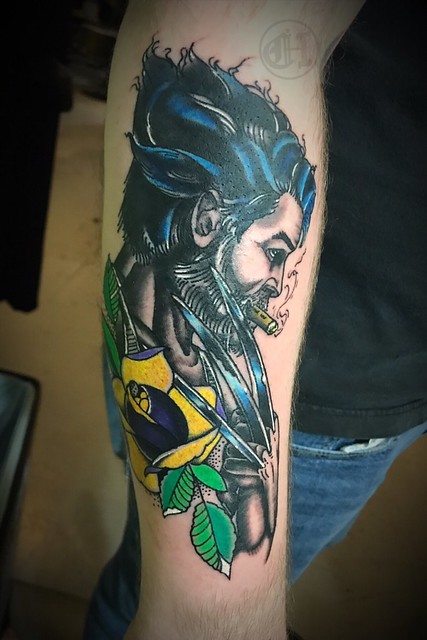 Logan tattoo with a little homage using the colors from wolverines X-men outfit.