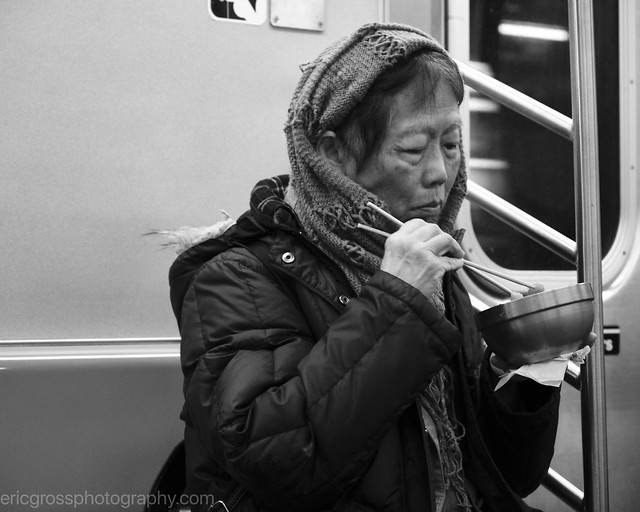 Woman Eating Dinner on the Train