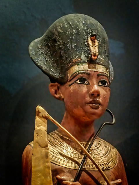 An ushabti figure of King Tutankhamun wearing the blue khepresh royal headdress 18th dynasty New Kingdom Egypt