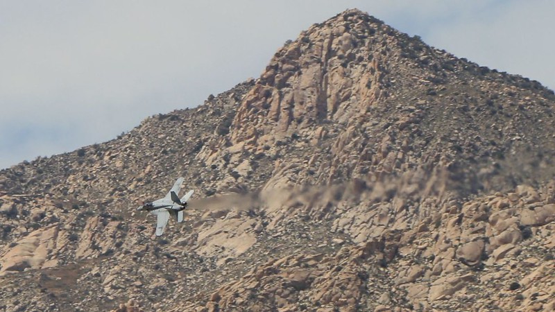 Out of nowhere, an F-18 Fighter Jet roared through the Collins Valley at high speed and low elevation