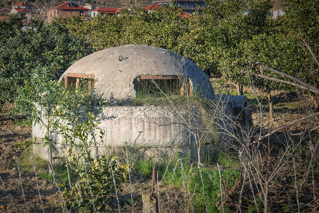 Soviet era bunkers adorn the Albanian countryside