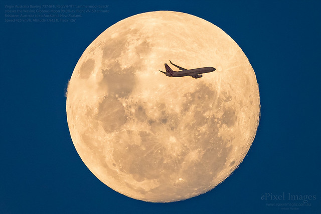Virgin Australia Boeing 737-8FE. Reg.VH-YIT 'Lammermoor Beach' crosses the Waxing Gibbous Moon 98.8%.