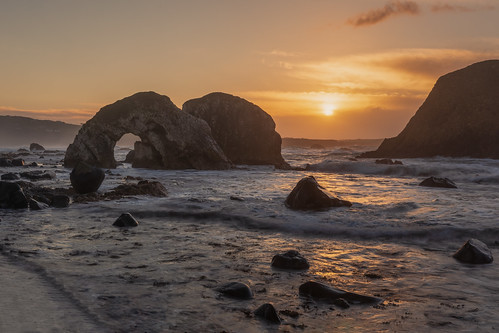 antrim seascape coast causeway sea arch ballintoy giants northern ireland sunset sunrise