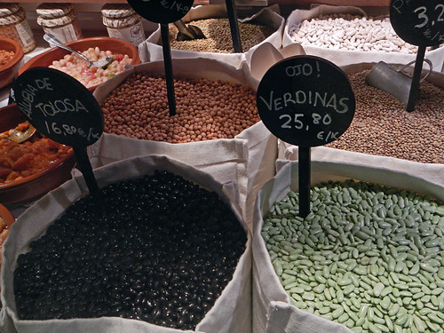Many different types of beans for sale at Mercado San Miguel in Madrid, Spain
