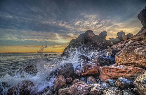 sunset pelicancove pointvicente rockyshore rocks sea pacificocean splash waves california