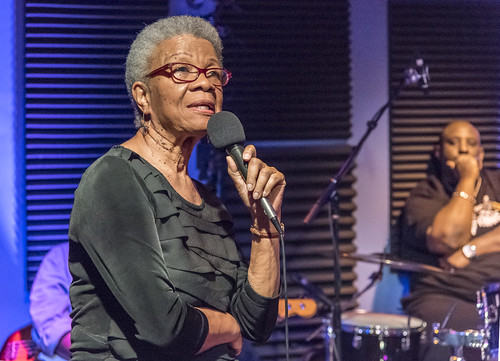 Germaine Bazzle at WWOZ. George and Gerald French in the background. Photo by Marc PoKempner.