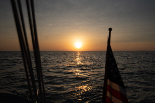sunset marathon cruise boat sun flag stern sky dusk ocean atlantic nikon d750 tokina 16278mm florida keys