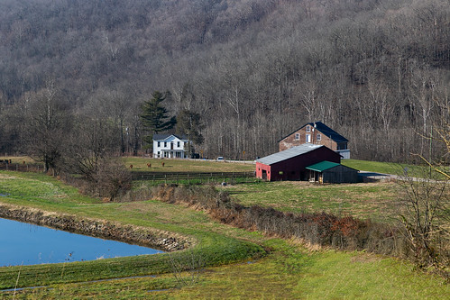 house dwelling residence farm mill georgetown ohio unitedstates us tunnelmill buildings structures reservoir water pond trees forest slope hillside valley grass landscape pleasanttownship browncounty