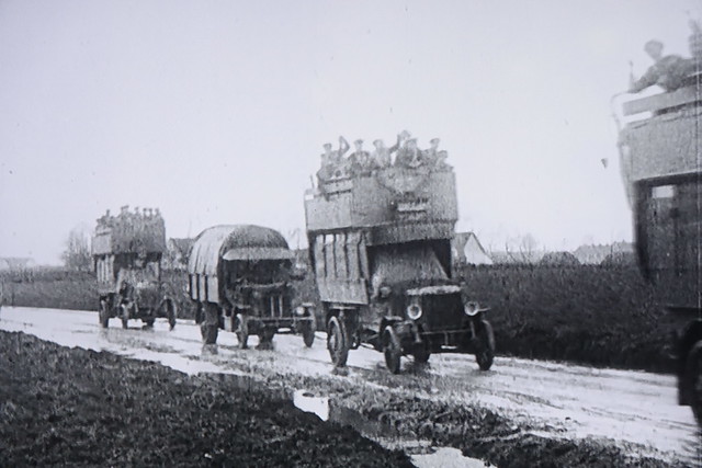 Two LGOC B-type buses heading to the front in the First World War, radiators gently boiling along the way