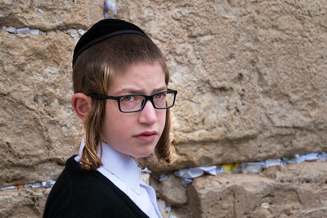 Orthodox boy at the Western Wall in Jerusalem, Israel.