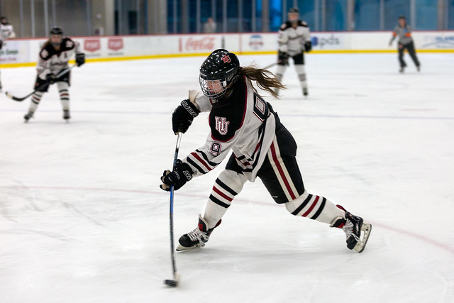 Jordan Hansen (9) Hamline University women's ice hockey game vs Concordia College; Hamline won the game 2-1