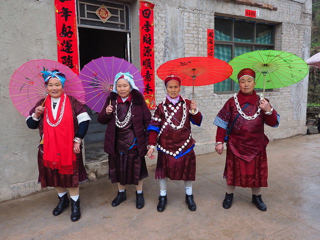 Quatuor of Gulong style Miao elders attending lunar new year festival