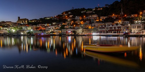 town city cityscape water waterfront reflection boats evening blue sea seascape lights hillside island caribbean travel