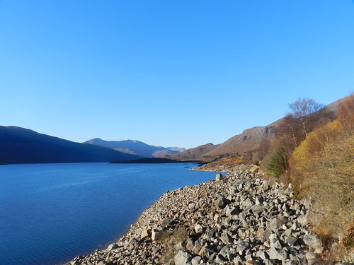 loch cluanie hydro scheme blue shades shadows rocks stones highlands scotland low view scenery allanmaciver
