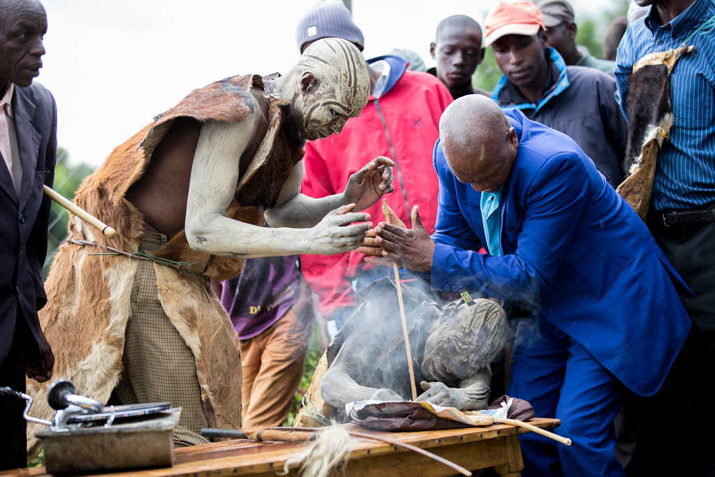 Ogiek clan members demostrating how they light fire during launch of the Sub-Catchment Management Plan (SCMP).