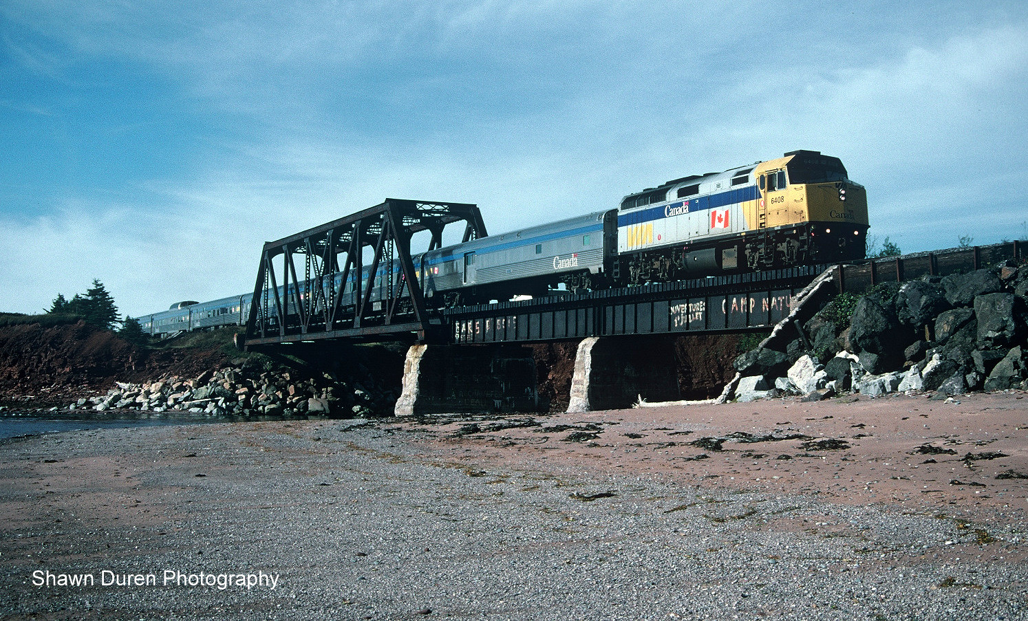 VIA Rail Train #16, the Chaleur crosses the bridge at Petit-Pabos, Quebec on October 4, 2003.