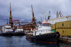 Tugboats and drydock at Neorion Shipyards, Ermoupolis, Syros