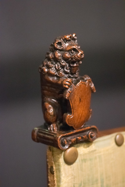 Lion carving on antique chair