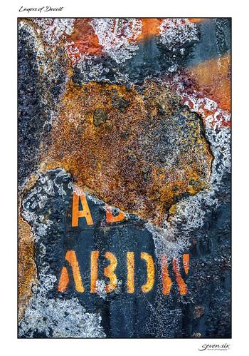 seven six photography rust rusty rusted old forgotten dirty paint crackedpaint painted letters green orange yellow abstract abstractphotography abstractart accidentalart sony rx10iii rx10m3 cybershot closeup macrophotography macro broken