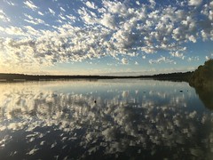 Clouds over Lake Joondalup reflection on the water