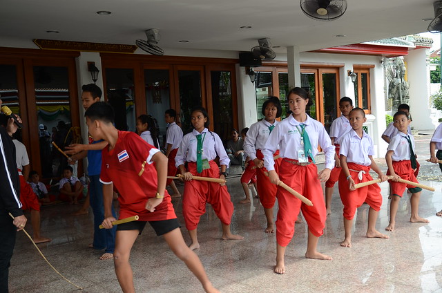 Thai school kids being taught classical Thai dance
