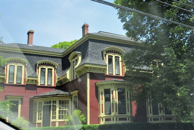 Glimpse of ornate Victorian house, Canning, Nova Scotia