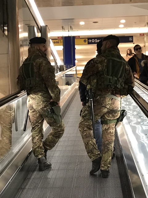 Perfect angle for this photo of two security guards in Milan's Central Station