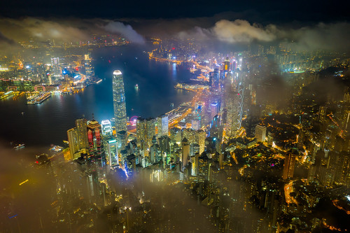 above aerial aerialview architecture asia asian blue building buildings business china city cityscape coulds district downtown drone dusk evening flying harbor harbour hong hongkong kong landmark landscape light metropolis modern mountain night office panorama peak peaks scene sea sky skyline skyscraper sunrise sunset topview travel urban victoria victoriapeak view hk