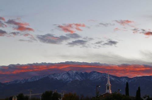 clouds storm color sunset steeple stuck mountains snow trees