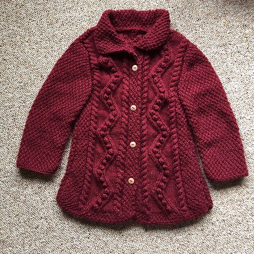 Heather knit this little cardigan for her six year old granddaughter