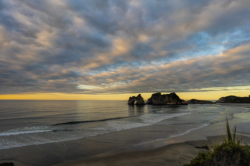 newzealand wharariki beach sunset cliff