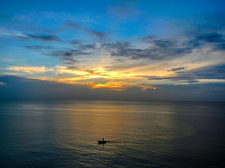 sunset with fisherman