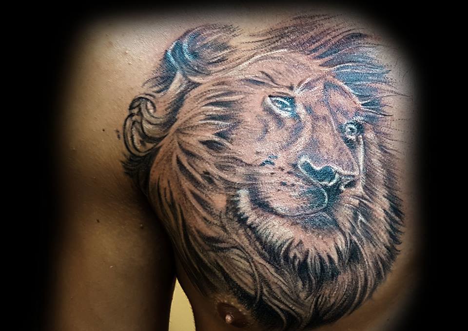 Aggregate 92+ about lion chest tattoo latest .vn