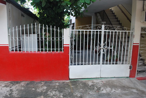 montecristi ecuador homeofthepanamahat wroughtiron white red gate fence stripe metallicobject