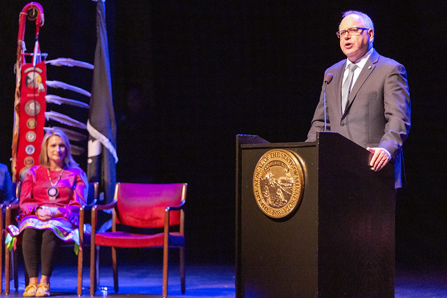 Governor Tim Walz speaking at the Fitzgerald Theater after being sworn in as Minnesota's 41st governor, St Paul MN. Lieutenant Governor, Peggy Flanagan is seated in the background. jpg