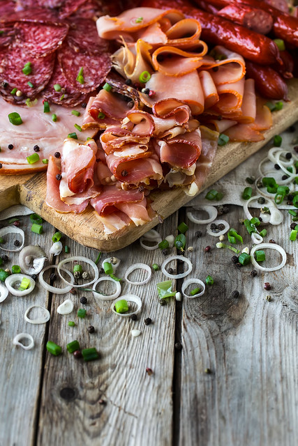 Ham, salami and sausages mix background